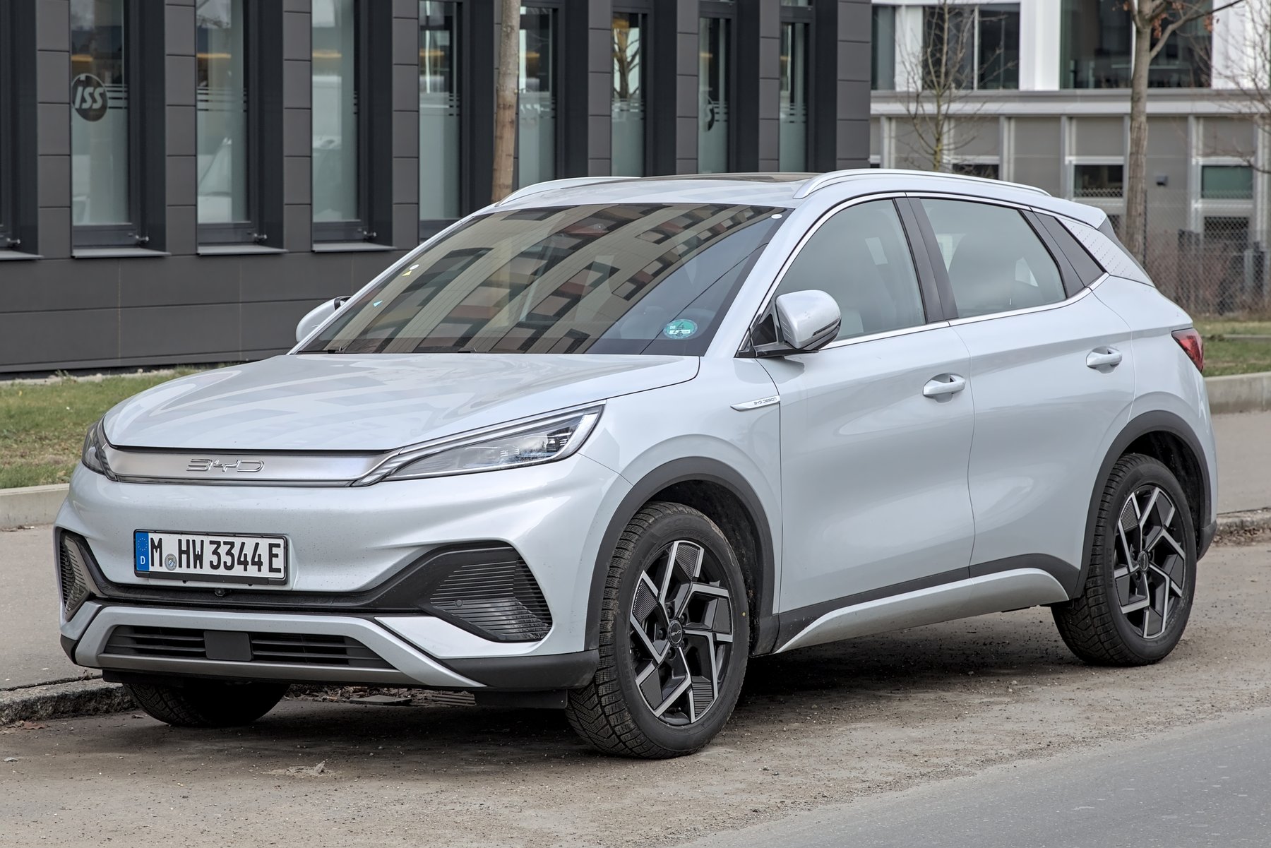 A silver BYD Atto 3 electric SUV photographed from the front-right