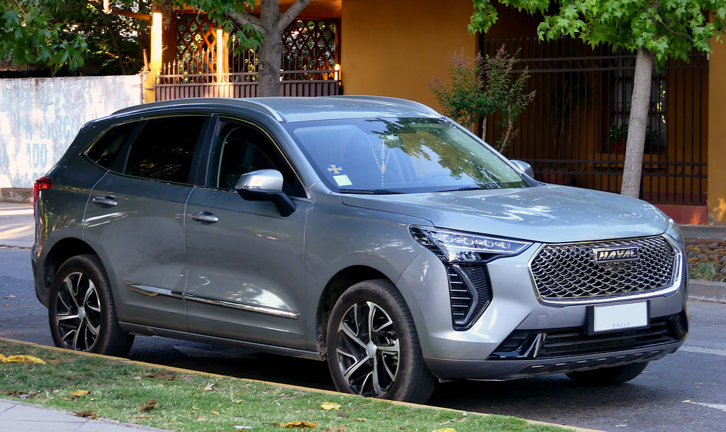 Side-by-side comparison of Geely EX5 electric SUV and Haval Jolion petrol SUV with pricing and cost breakdown for South Afric