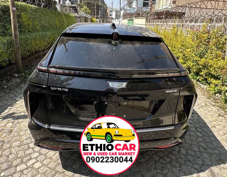 Side-by-side comparison of Geely EX5 electric SUV and Toyota Corolla Cross petrol model with pricing and cost breakdown for S